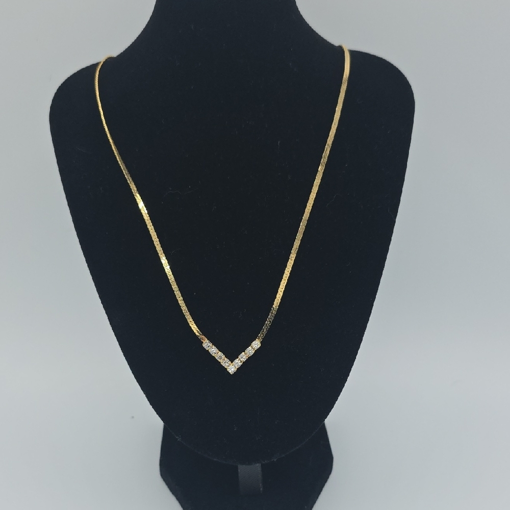 Elegant Gold Necklace with Silver Accents